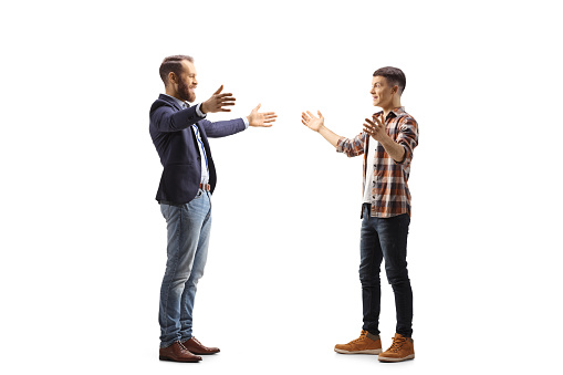Young professional man meeting a guy isolated on white background