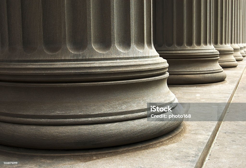 Bottom side of classic marble columns close-up of columns of a old building Banking Stock Photo