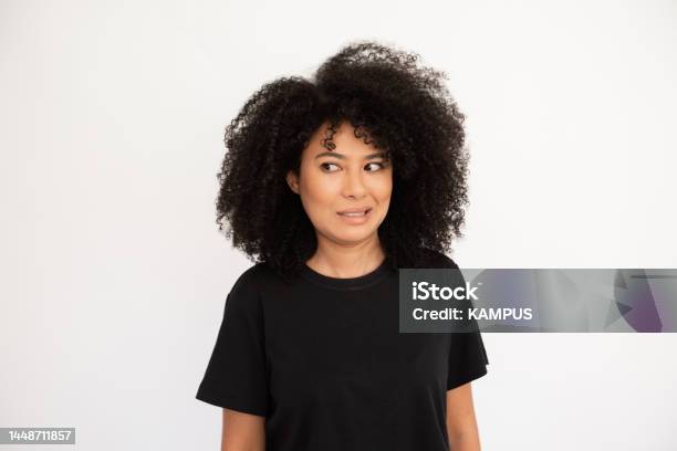 Dissatisfied Young Woman Showing Irritation Stock Photo - Download Image Now - Disappointment, One Woman Only, White Background