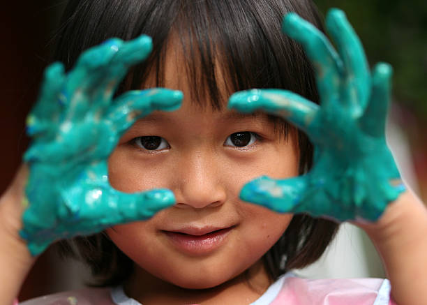 istock child  & painting job 144871300