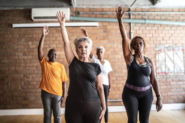 Senior women stretching in a exercise class