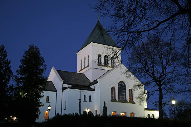 Beautiful White Church at Night stock photo