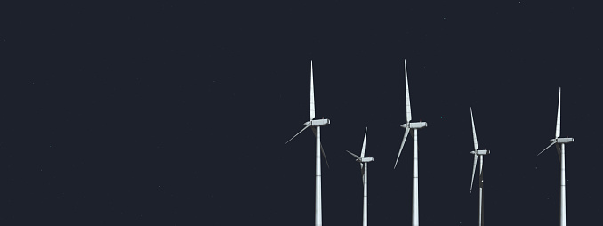 Computer generated 3D illustration with wind turbines at night