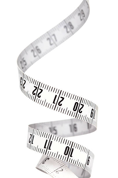 istock Curled-up tape measure on a white background 144872377