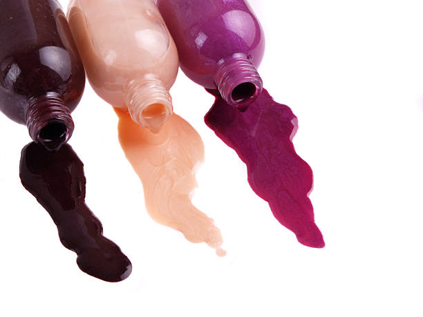 nail polish spilling out stock photo