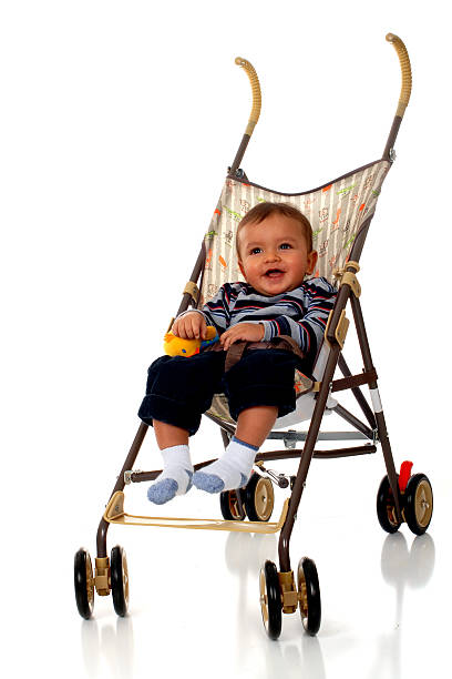 istock A baby in a stroller on a white background 144873168