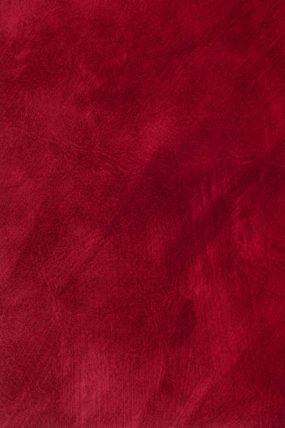 istock Red orange textured surface background with uneven paint strokes. Vertical framing 1448735871