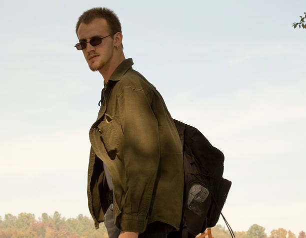 Young man with backpack. stock photo