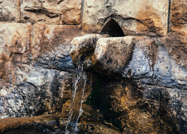 Water flowing from a stone fountain