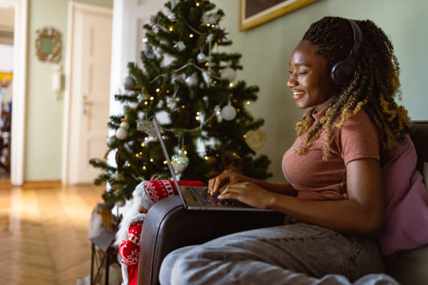 istock Woman working at home. Its a Christmas 1448740047