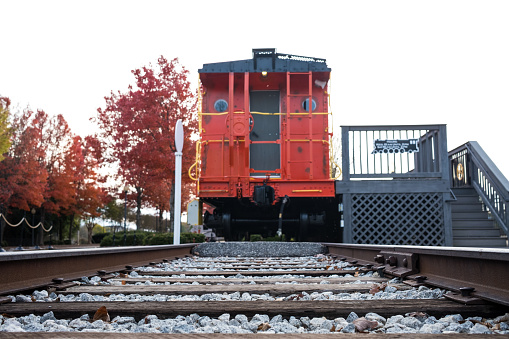 Traintracks and Red Caboose from a Low Angle