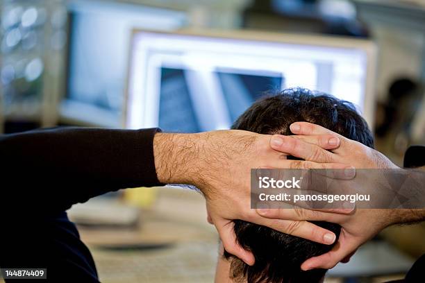 Business Man Working Stock Photo - Download Image Now - Hands Behind Head, Office, Rear View