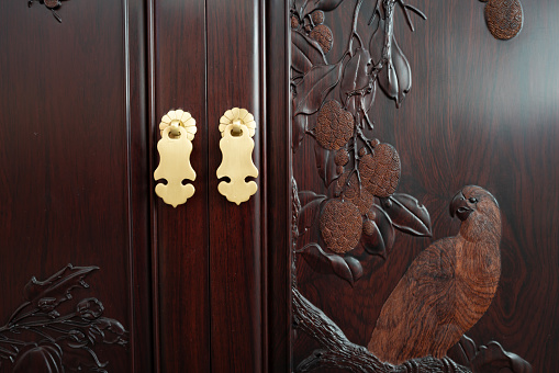 Beautiful patterns, wooden carved on the door.Oriental craft.
