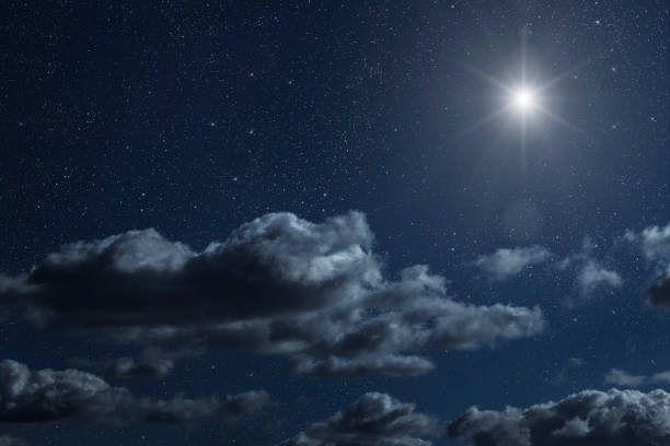 istock Backgrounds night sky with stars moon and clouds for Christmas 1448748980
