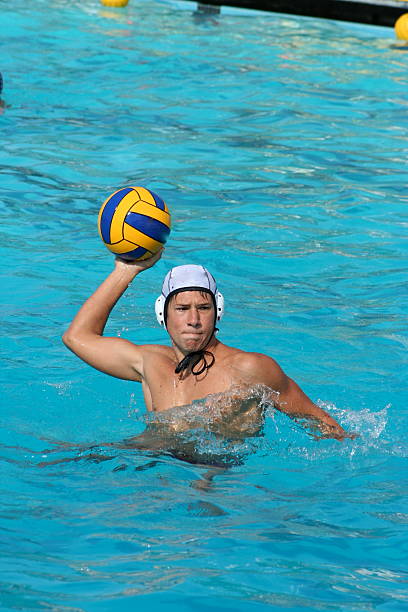 Water polo player warming up before a game.