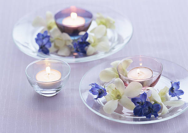 candles lifestyle with flowers stock photo