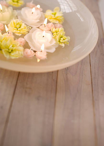 candles lifestyle with flowers stock photo