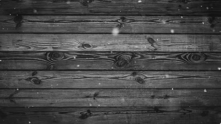 brown wood wall texture with white snow and stars. Christmas background