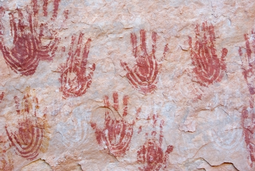 These painted handprints are located on a sandstone cliff wall in Salt Creek, Canyonlands National Park, Utah.