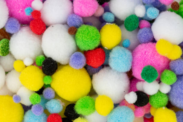 istock the small colorful pom pom balls (pompoms) 1448752887