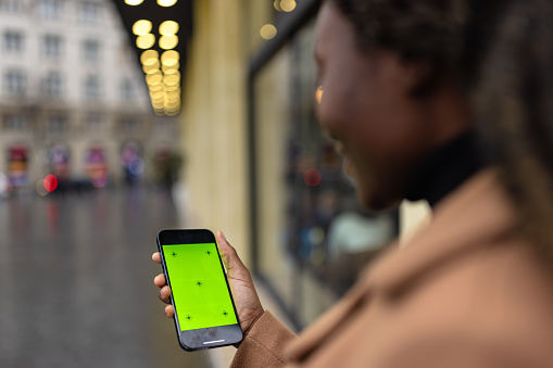 Black woman using mobile app