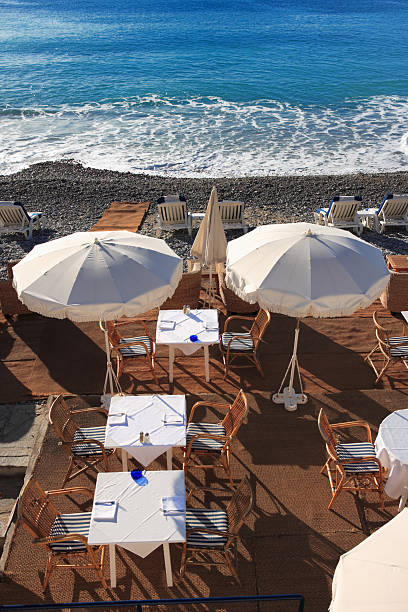 istock seaside restaurant at beach with sunshades 144875386