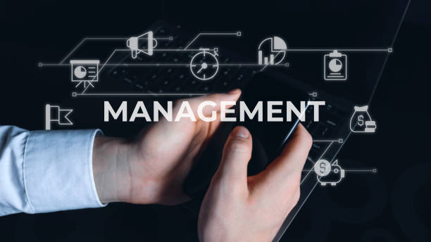 istock Management closeup concept image with white glyph icons 1448755196
