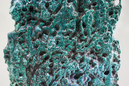 Close-up of naturally occurring rare green crystalline ore