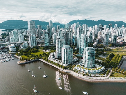 Wide angle view of modern apartments along the waterfront at False Creek, Vancouver, Canada.