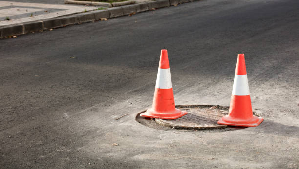istock road hazard signaling cones. on road maintenance works 1448763306
