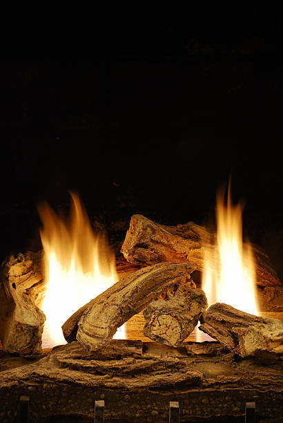 Christmas Fire Gas logs fireplace mickey mantle stock pictures, royalty-free photos & images