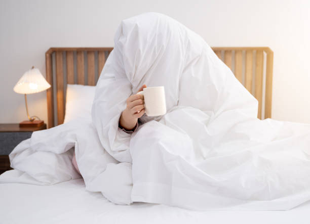 istock Woman waking up in the morning 1448764478