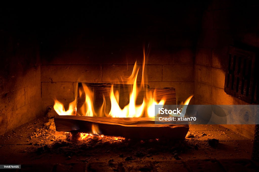 Fireplace Warm glow of the light from the fire  Fire - Natural Phenomenon Stock Photo