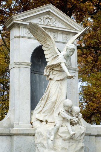 tombstone with angel. Picture made on Old Cementary in Lodz. Monument was build in XIX century