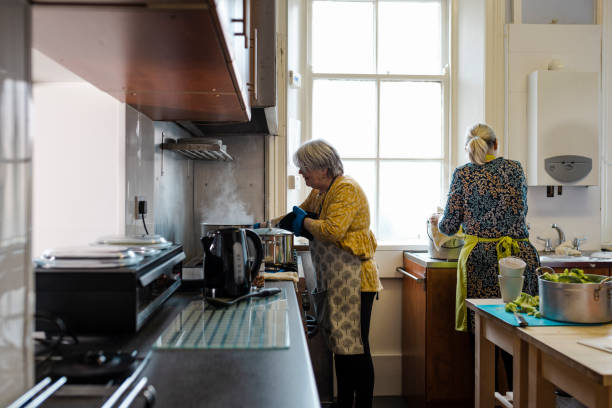 istock Volunteers Busy in the Kitchen 1448774011