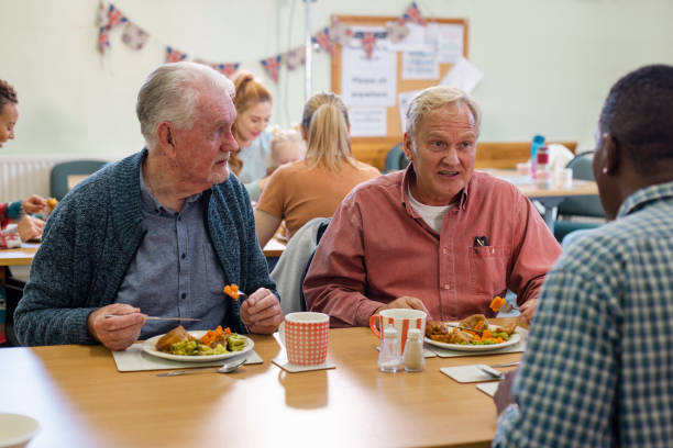 istock Chatting with Friends at Warm Food Hub 1448774417