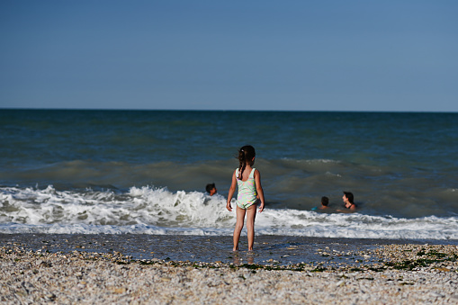 Little girl with shell