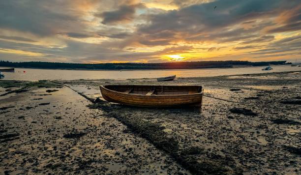 istock Sunset Boat on the water 1448777277