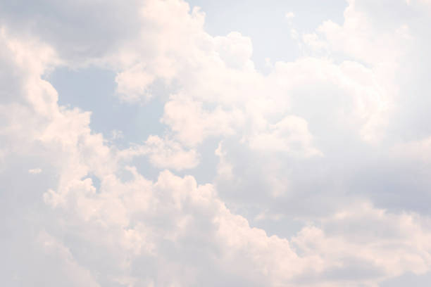 istock Fluffy clouds. The natural backdrop of the sky 1448777590