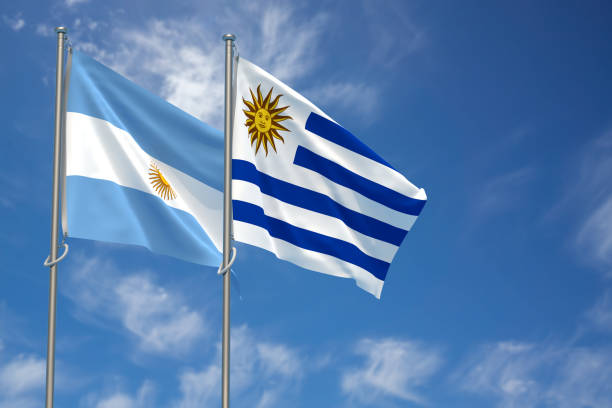 argentinien und die orientalische republik uruguay flaggen über blauem himmel. 3d-illustration - oriental republic of uraguay stock-fotos und bilder