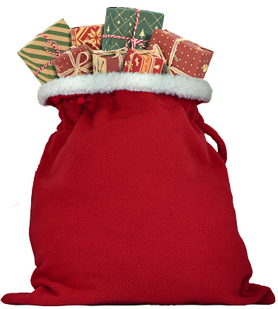 Santa Claus sack full of gifts presents in Christmas time isolated on white