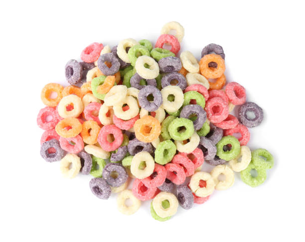 istock Sweet crispy corn rings on white background, top view. Breakfast cereal 1448779880