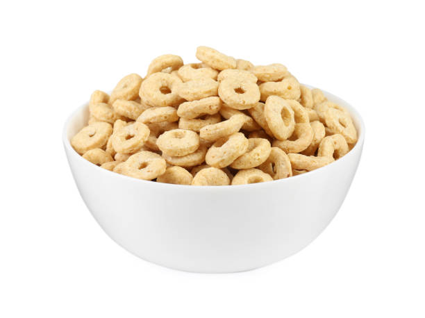istock Bowl of sweet crispy corn rings on white background. Breakfast cereal 1448779902
