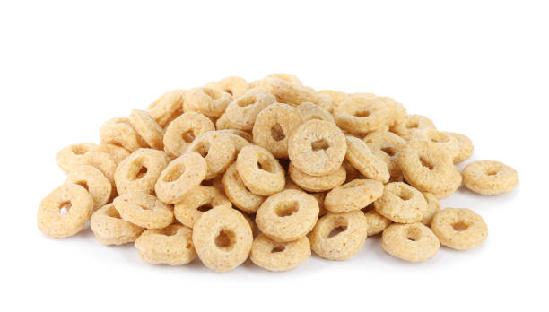 istock Sweet crispy corn rings on white background. Breakfast cereal 1448780099