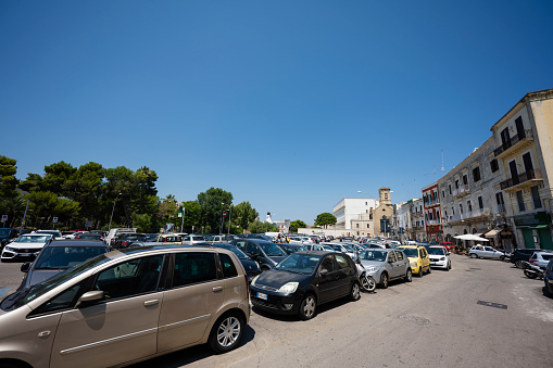 Bari, Italy - Jule 19, 2022: Lots of tightly parked cars in Bari, Italy.