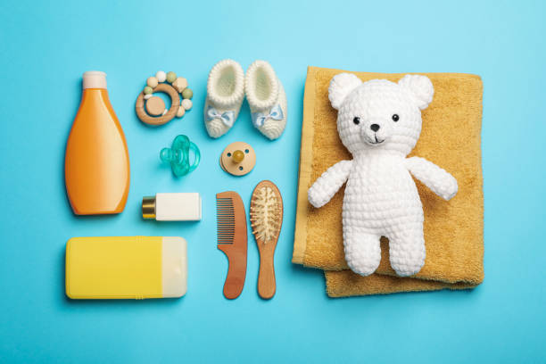 istock Flat lay composition with baby cosmetic products on turquoise background 1448786882