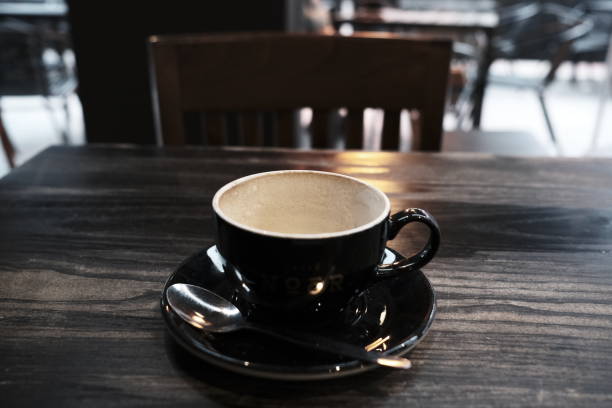 istock a wooden table in a cafe with diffused light in the background 1448787900