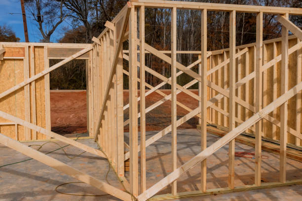 istock Construction wood framing beams of a new house under construction 1448788278