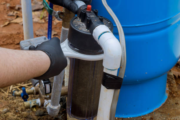 istock Maintenance performed by professional workers replacement of replaceable filters for cleaning water in outside near the home 1448788286