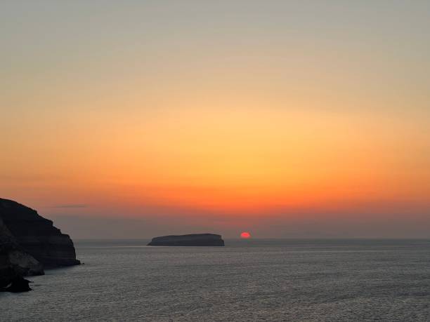 istock Sunset on the Coast of Santorini 1448789494
